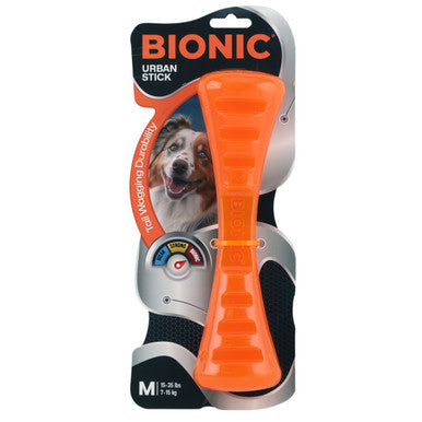 BIONIC Urban Stick Treats Holding Orange Dog Chew Toy