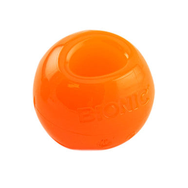 BIONIC Bounce Treats Holding Orange Dog Ball Toy